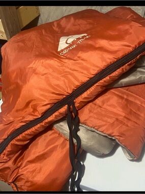 Ozark Trail Bright Orange Sleeping Bag with White Logo
